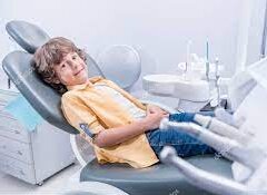 sitting in dental chair